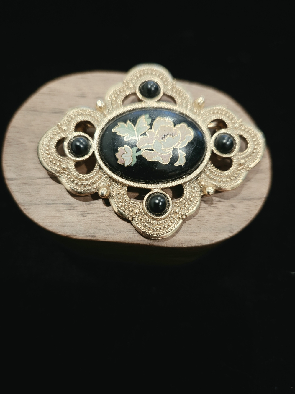 Vintage 1928 Gold-Tone Black Floral Enamel Brooch - Elegant Women’s Jewelry